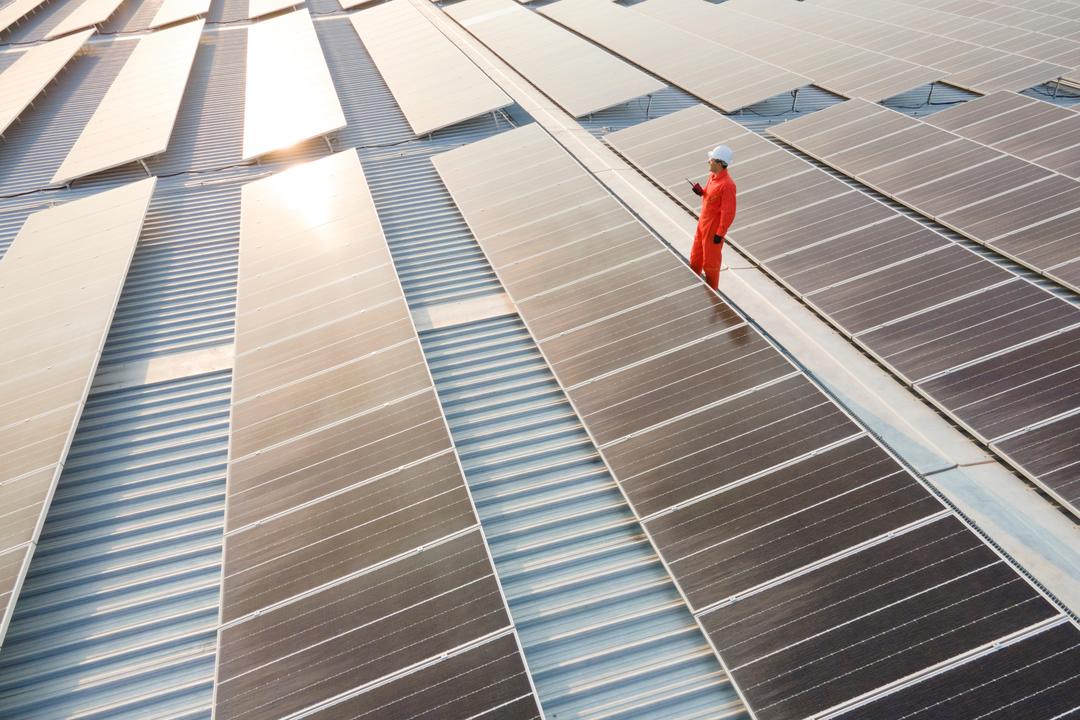 An image of solar panels, illustrating the idea that solar energy promotes social well-being, environmental preservation, and economic prosperity, all factors of the triple bottom line.