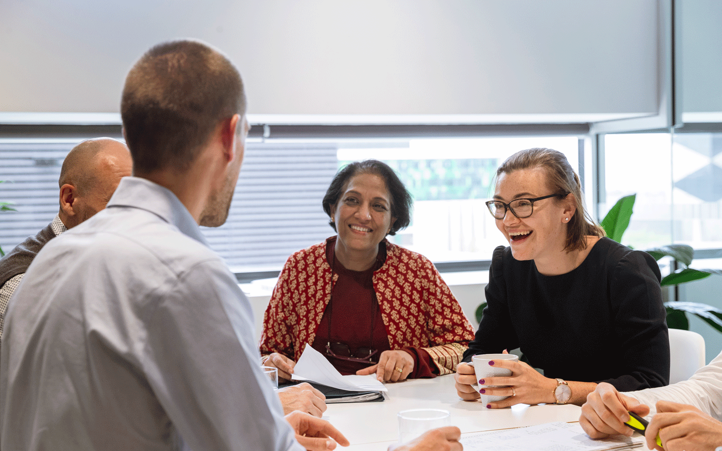 multi racial women in boardroom