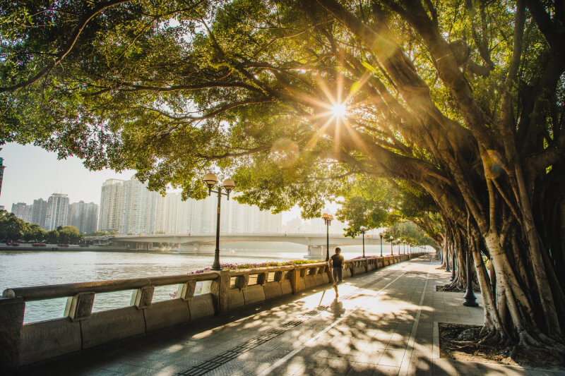 Jogging along the river as the sun sets